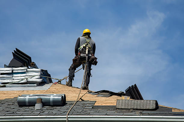 Professional Roof Replacement technician working in Garrison, ND